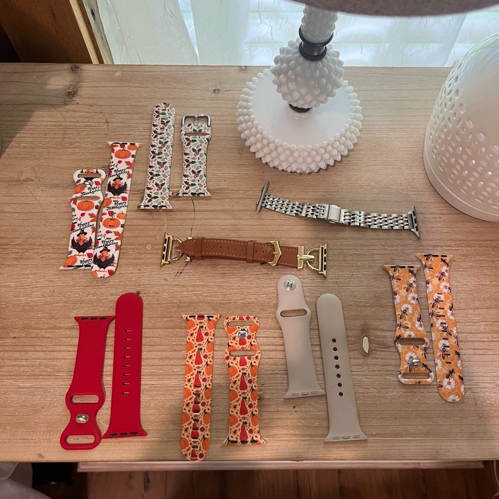 Apple Watch Bands in Red, Brown, and Cream